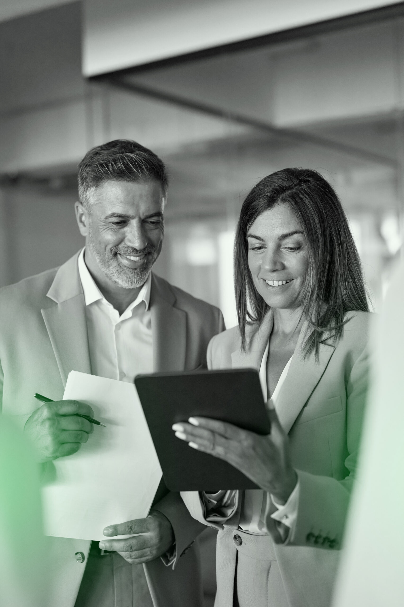Busy,Smiling,Executive,Business,Team,Using,Tablet,Holding,Papes,Standing